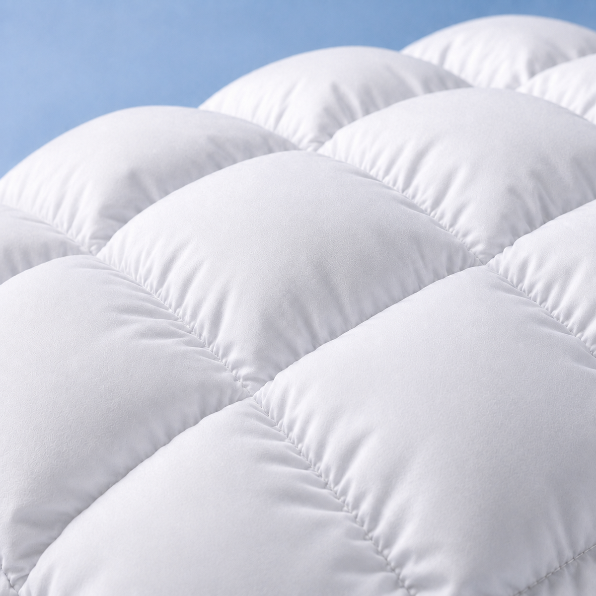 Close-up of the puff-grid quilting, showing individual rounded cells